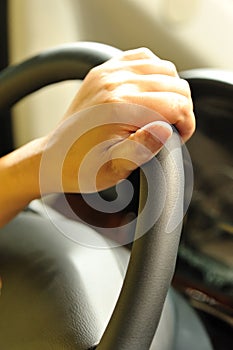 hand on steeringwheel