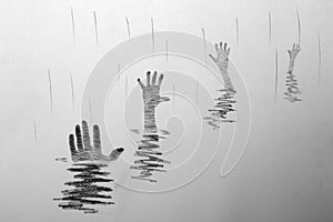 Hand sticking out of water