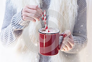 Hand stirring hot chocolate