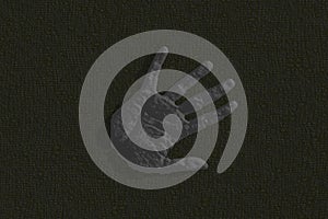 Hand stone texture on dark background top view