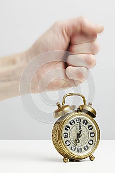 Hand stopping alarm on clock