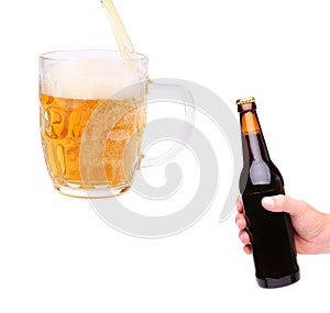 Hand, stream, glass and bottle of beer