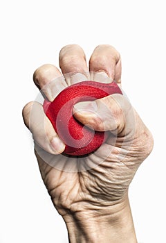 Hand of stressed man squeezing ball