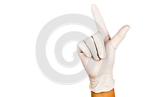 Hand in surgical latex glove gesture number Seven