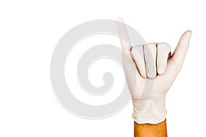 Hand in surgical latex glove gesture number Six