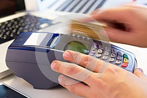 Hand Swiping Credit Card In Store