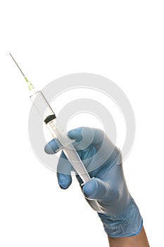 Hand and syringe