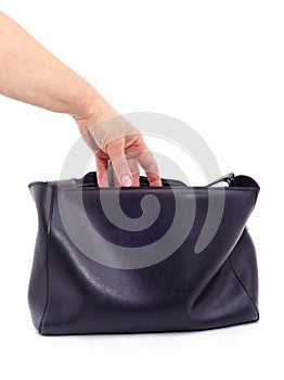 A hand that takes out of a bag