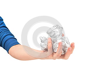 Hand taking a crumpled paper ball
