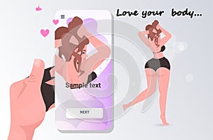 Hand taking photo of girl in bikini on smartphone camera social network love your body concept