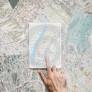 hand tapping tablet with map. High quality photo