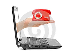 Hand with telephone and notebook