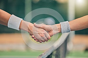 Hand, tennis and handshake for partnership, unity or greeting in sportsmanship at the outdoor court. Players shaking