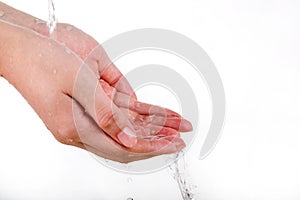 The hand then water isolated on white