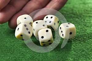 Hand throwing dices