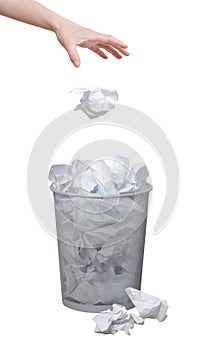 Hand throwing out paper