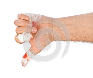 Hand thumb with blood and bandage