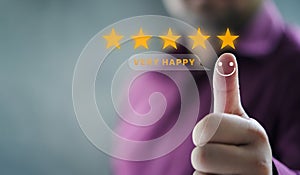 Hand with thumb up positive emotion smiley face icon and 5 star with copy space