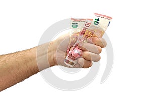 Hand tightening 10 euros banknotes isolated on photo