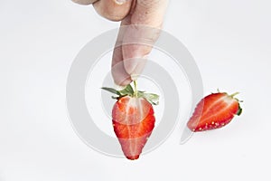 Hand took fruit strawberry
