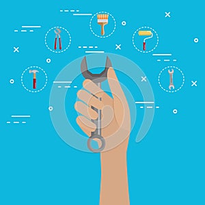 Hand with tool and under construction equipment