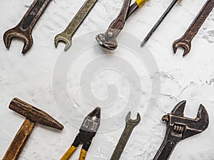 Hand tools lying on the table. Top view