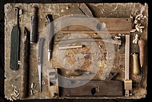 Hand tools Wood on an old wooden workbench