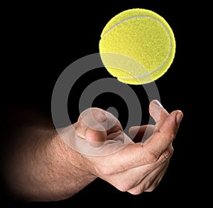 Hand Tossing Tennis Ball