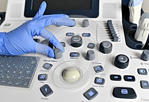 Hand touch button for medical device for ultrasound examination of the body for the purpose of diagnosis