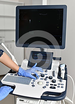 Hand touch button for medical device for ultrasound examination of the body for the purpose of diagnosis