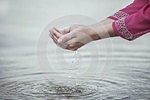 Hand touch water