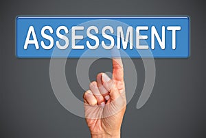 Hand touching assessment button