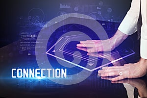 Hand touching digital table