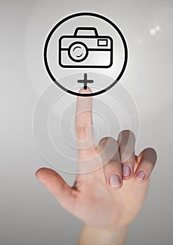 Hand touching photo camera icon