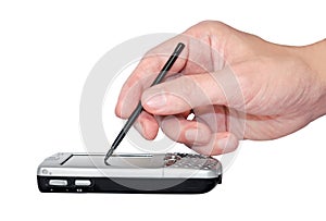 Hand touching the screen of palmtop