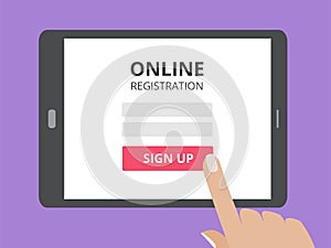 Hand touching screen of tablet computer with online registration form and sign up button.