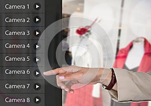 Hand Touching Security camera App Interface clothes shop