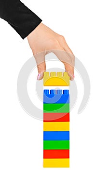 Hand and toy tower