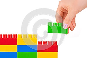 Hand and toy wall