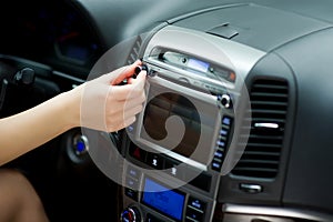 Hand tunes in radio stations and adjusting sound volume on the car audio system. Parameter settings through the on-board computer