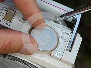 Hand tuning a vintage radio