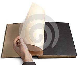 Hand turning page photo