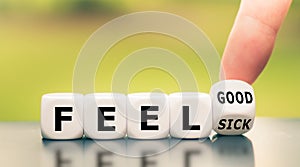 Hand turns a dice and changes the expression `feel sick` to `feel good.