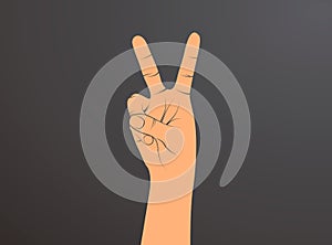 Hand with two fingers up in the peace or victory symbol. Also the sign for the letter V in sign language.Man or woman hand.