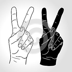 Hand with two fingers up in the peace or victory symbol