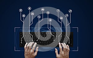 Hand typing on computer keyboard with application programming interface icon