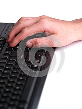 Hand typing on a key board