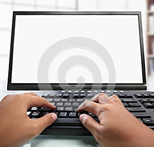 Hand typing keyboard with blank monitor