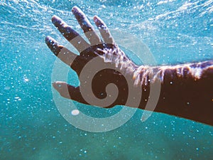 Hand under water