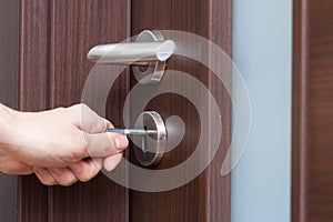 Hand unlocking house door